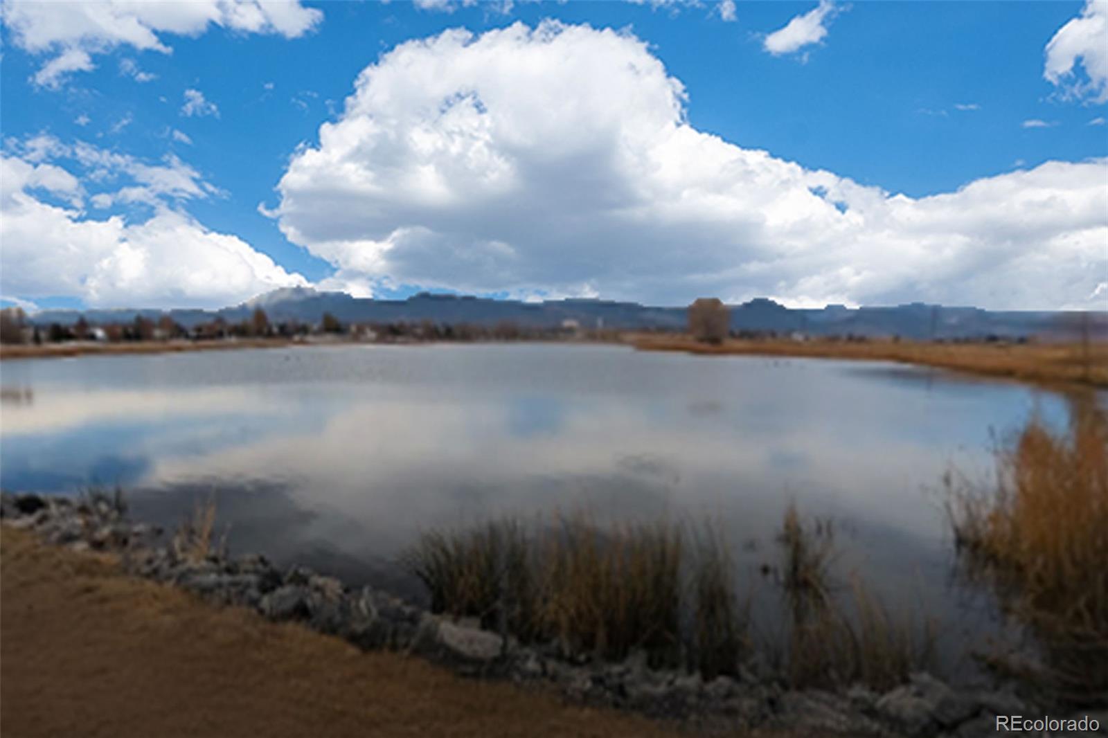 1680 Rivergate Way Berthoud, CO 80513 - Photo 34 of 41 a view of lake from middle of house