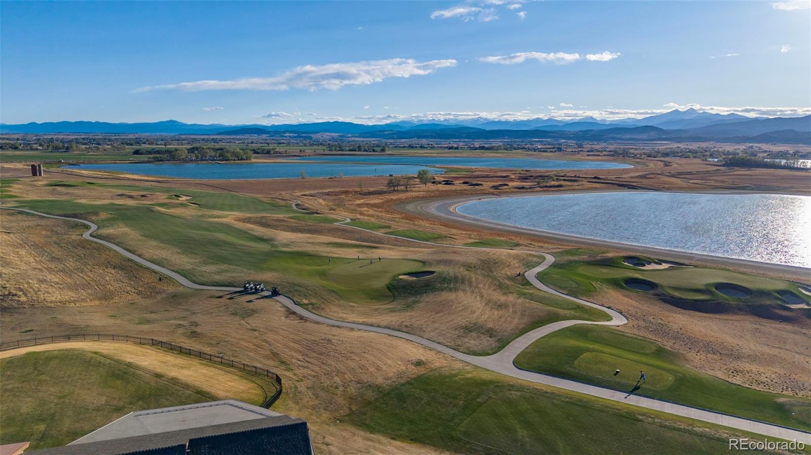 1680 Rivergate Way Berthoud, CO 80513 - Photo 38 of 41 a view of a lake with a mountain
