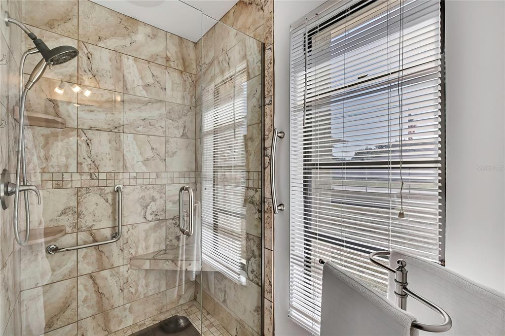 9059 Gaynor Street Spring Hill, FL 34608 - Photo 24 of 36 a bathroom with a shower