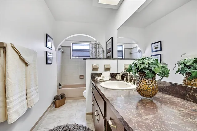 a view of a room with a table and chairs