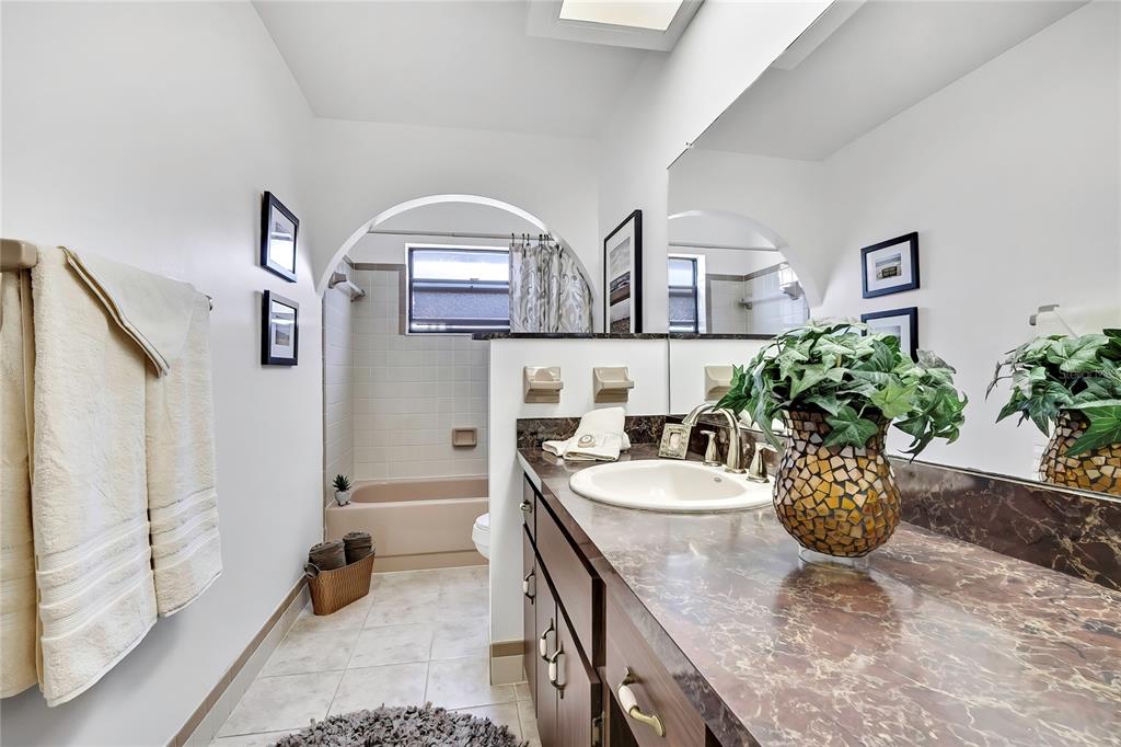 9059 Gaynor Street Spring Hill, FL 34608 - Photo 27 of 36 a dining room with furniture and wooden floor