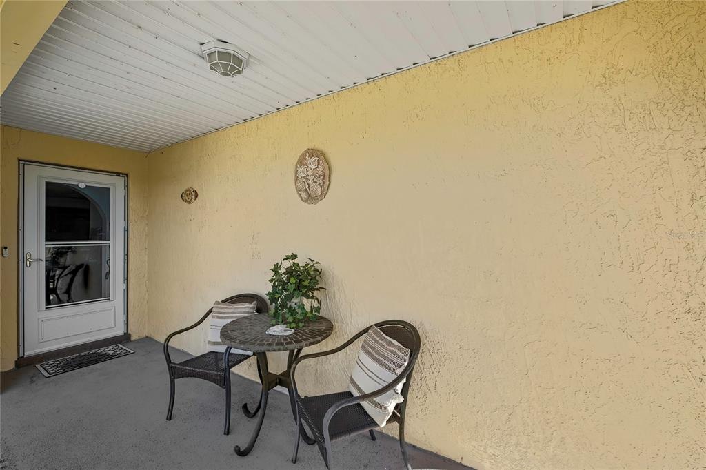 9059 Gaynor Street Spring Hill, FL 34608 - Photo 34 of 36 a view of a room with a table and chairs