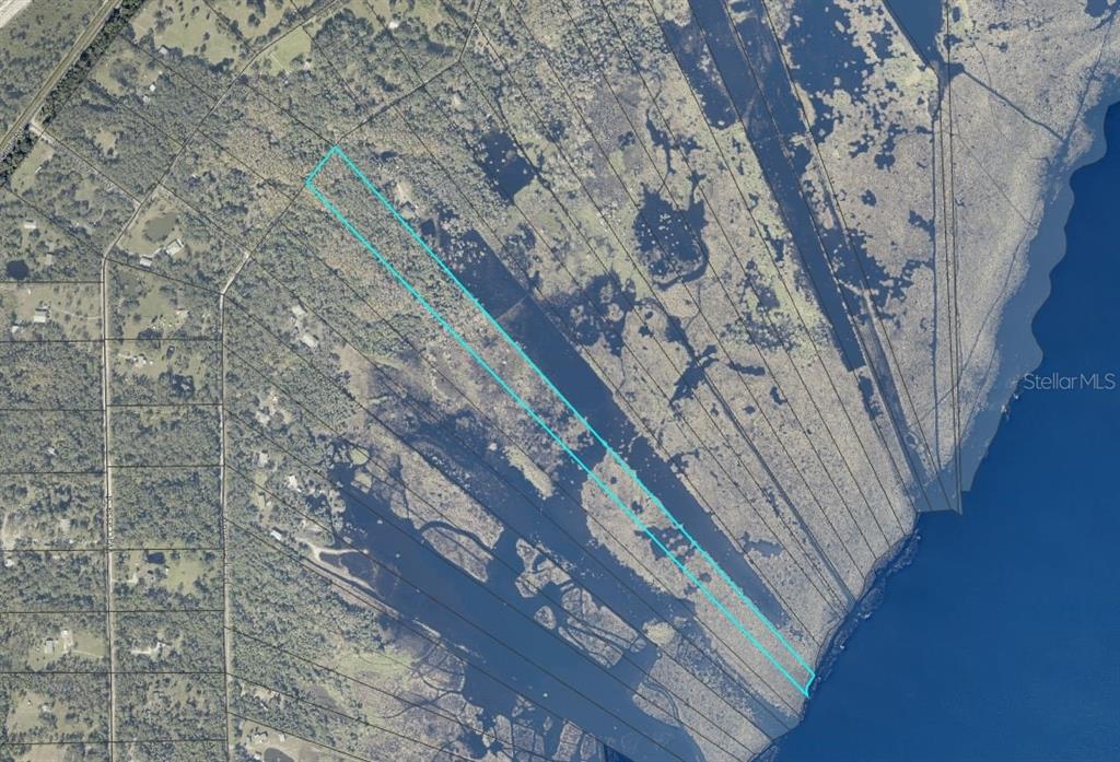 2 West Osceola Road Geneva, FL 32732 - Photo 5 of 5 a view of entryway with wooden floor