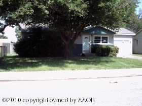5106 South Bonham Street Amarillo, TX 79110 - Photo 2 of 6 a front view of a house with a yard