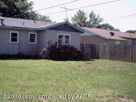 5106 South Bonham Street Amarillo, TX 79110 - Photo 6 of 6 a house view with a backyard space