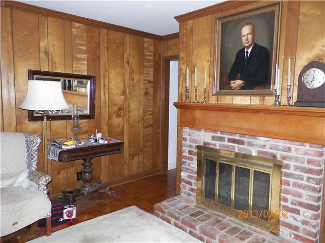 1043 Moran Road Franklin, TN 37069 - Photo 3 of 11 family room with fireplace doors leading to second story wood deck