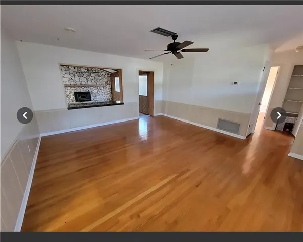 a view of a livingroom with a fireplace