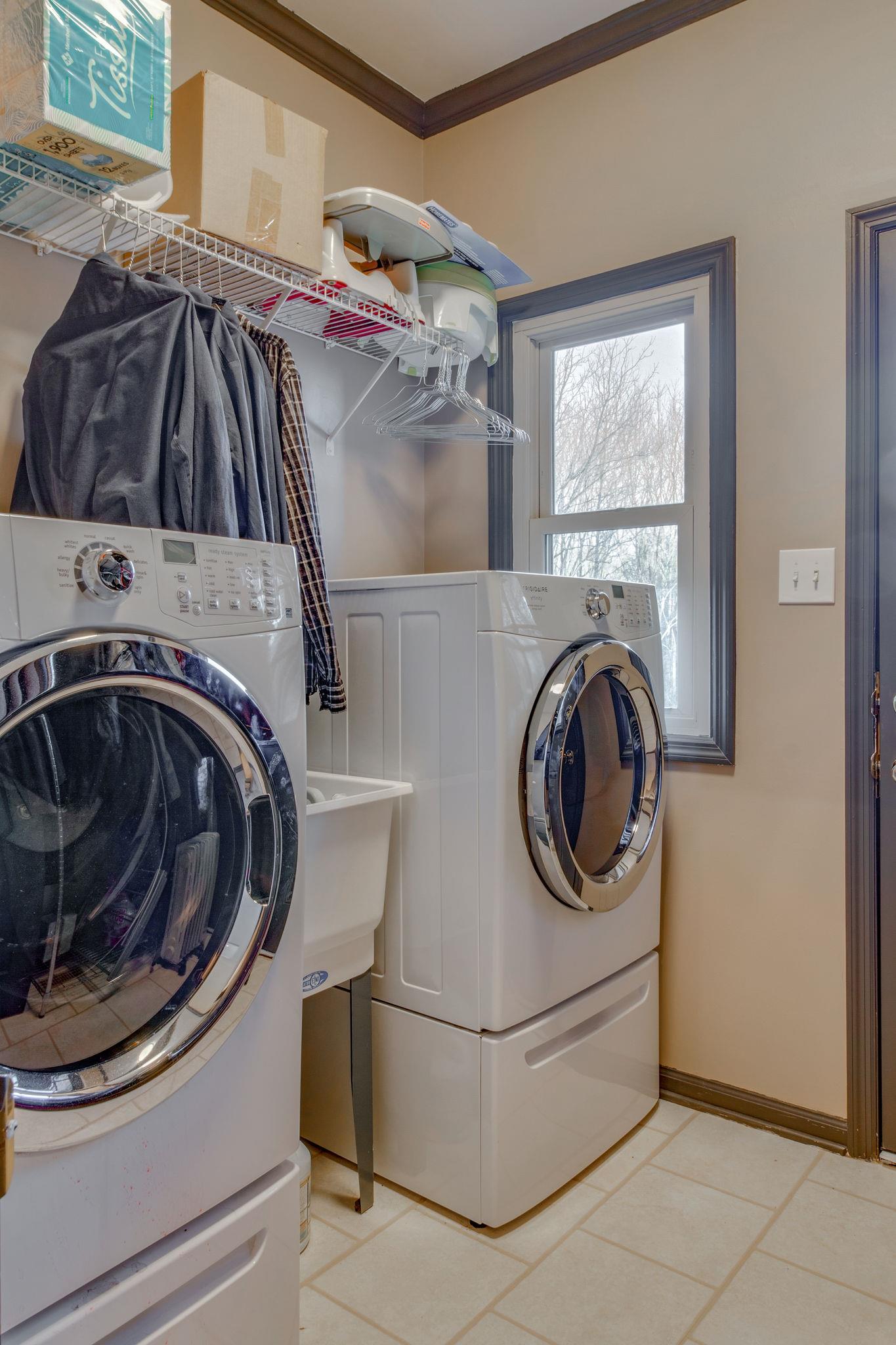 1040 Rip Steele Road Columbia, TN 38401 - Photo 19 of 25 a utility room with dryer and washer