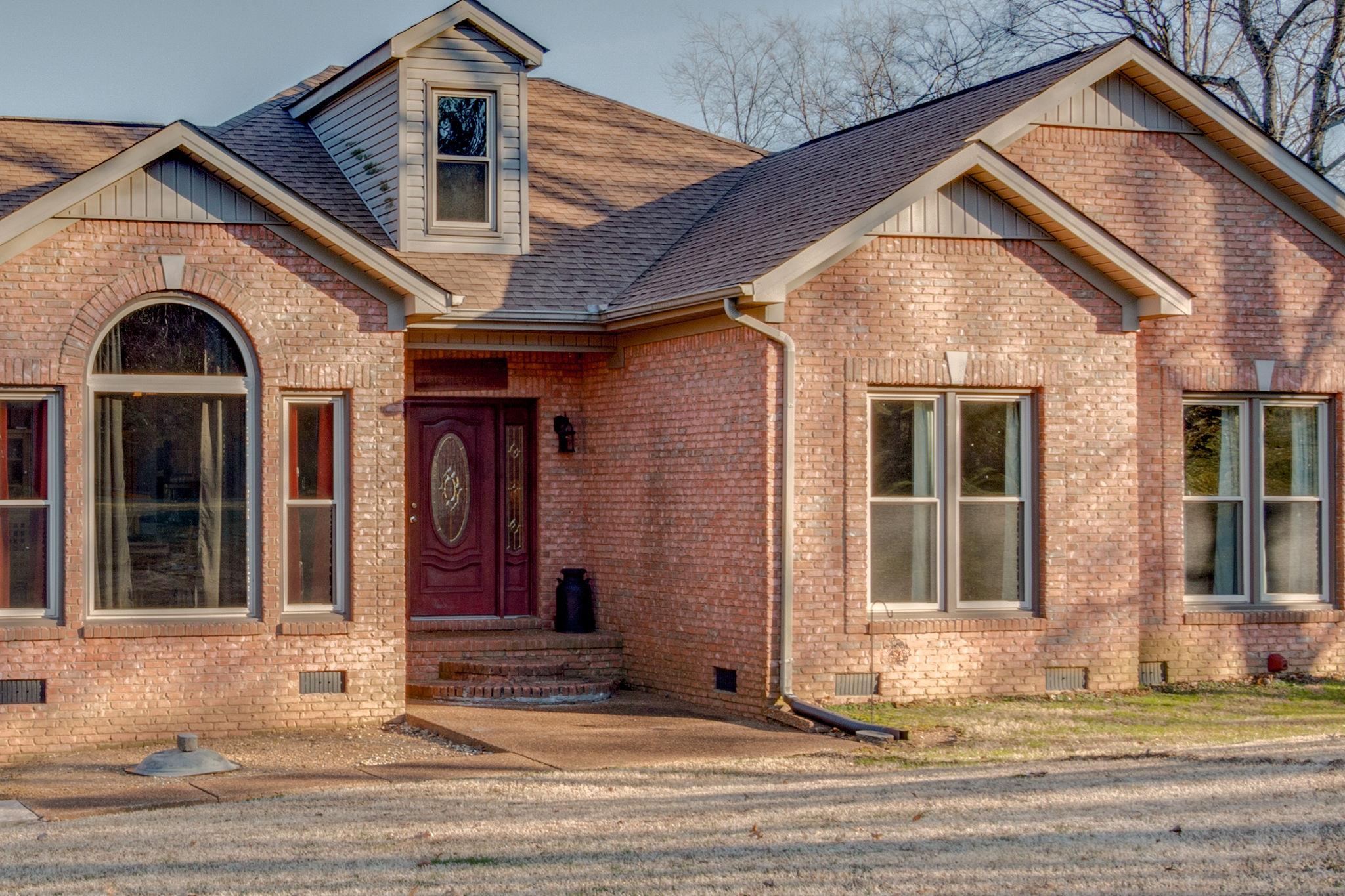 1040 Rip Steele Road Columbia, TN 38401 - Photo 3 of 25 a front view of a house with a yard