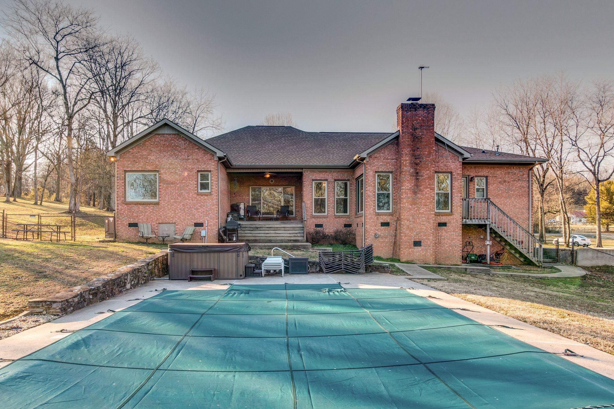 1040 Rip Steele Road Columbia, TN 38401 - Photo 23 of 25 a front view of a house with garden