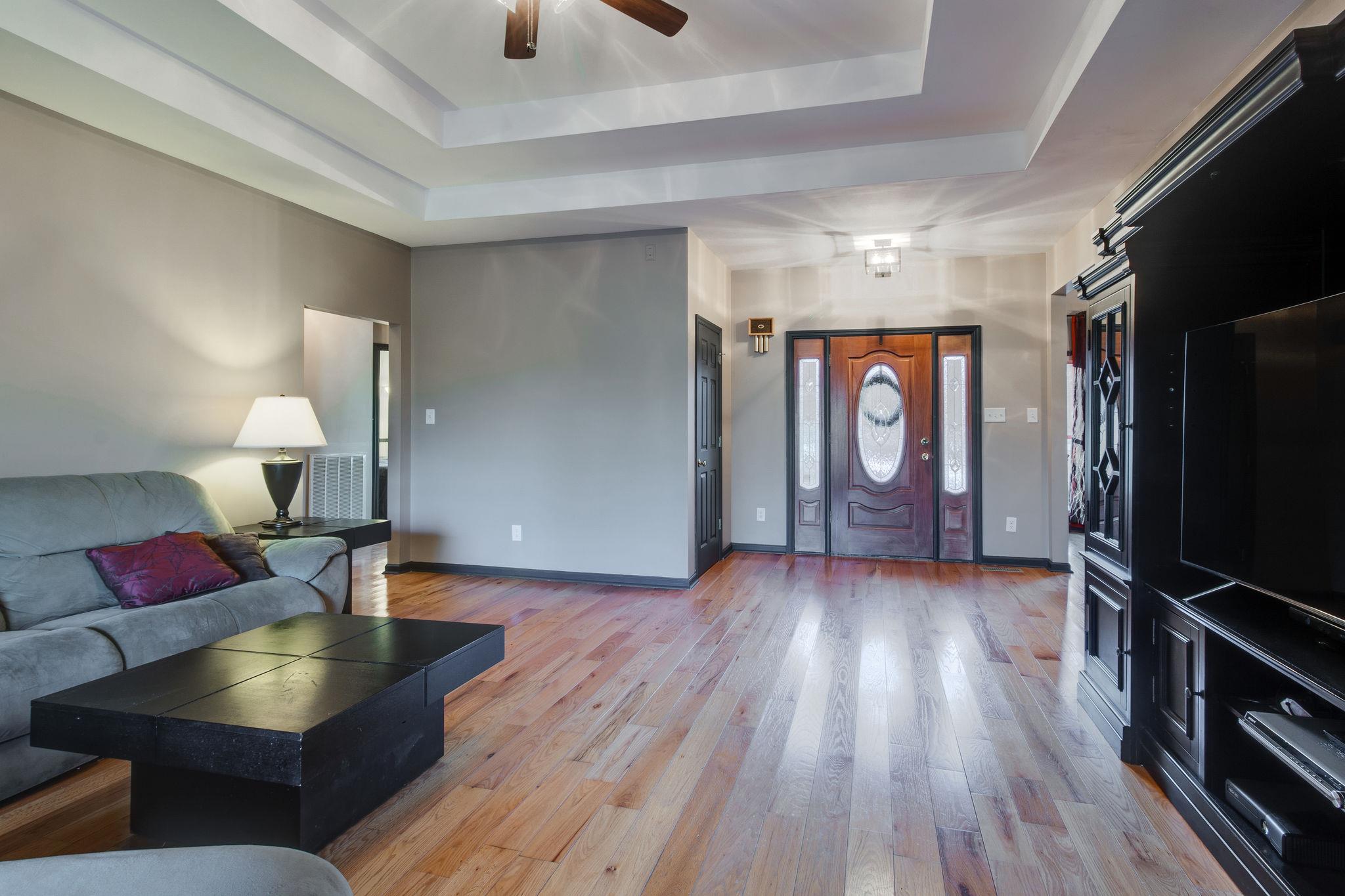 1040 Rip Steele Road Columbia, TN 38401 - Photo 5 of 25 a living room with furniture and a flat screen tv