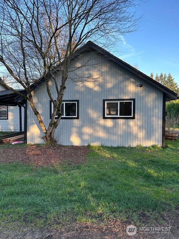 10341 184th Avenue Southwest Rochester, WA 98579 - Photo 24 of 36 a view of a backyard of the house