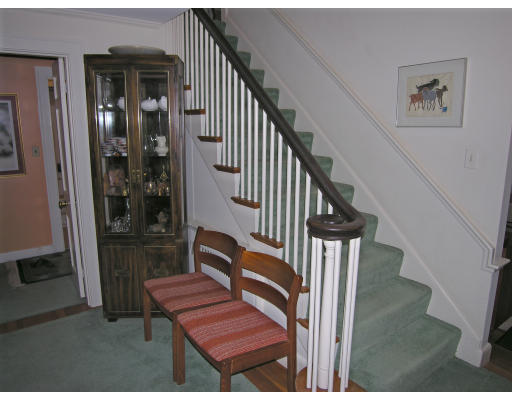 259 Hillcrest Road Needham, MA 02492 - Photo 2 of 10 a view of staircase with wooden floor and a rug
