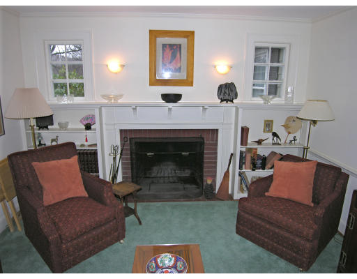 259 Hillcrest Road Needham, MA 02492 - Photo 3 of 10 a living room with furniture and a fireplace