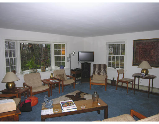 259 Hillcrest Road Needham, MA 02492 - Photo 7 of 10 a living room with furniture and a large window