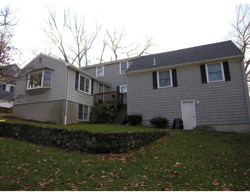 259 Hillcrest Road Needham, MA 02492 - Photo 8 of 10 a view of a house with a yard