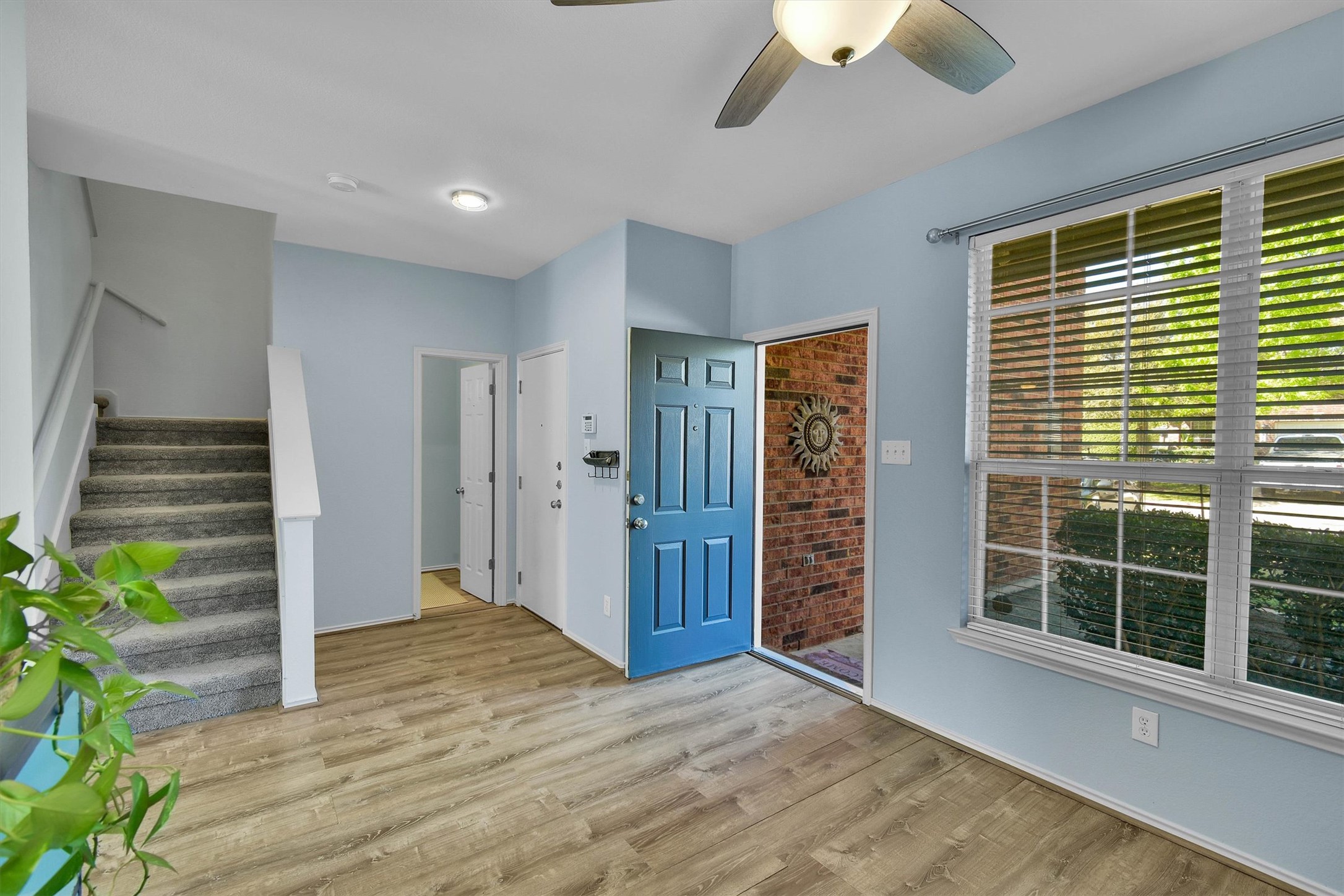 92 Verde Ranch Loop Leander, TX 78641 - Photo 6 of 37 Entrance foyer with ceiling fan and light wood-type flooring