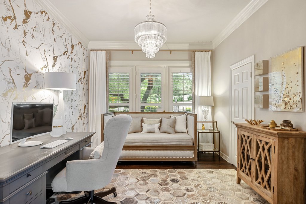 7609 Sandia Loop Austin, TX 78735 - Photo 23 of 40 This dedicated office space provides a quiet environment for work, featuring an elegant chandelier, a custom accent wall, and large windows