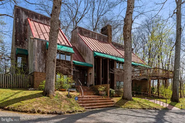 a front view of a house with a porch