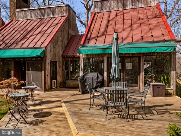 a view of a table and chairs in patio