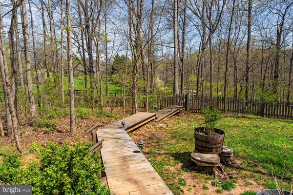 a view of a grassy area with an trees