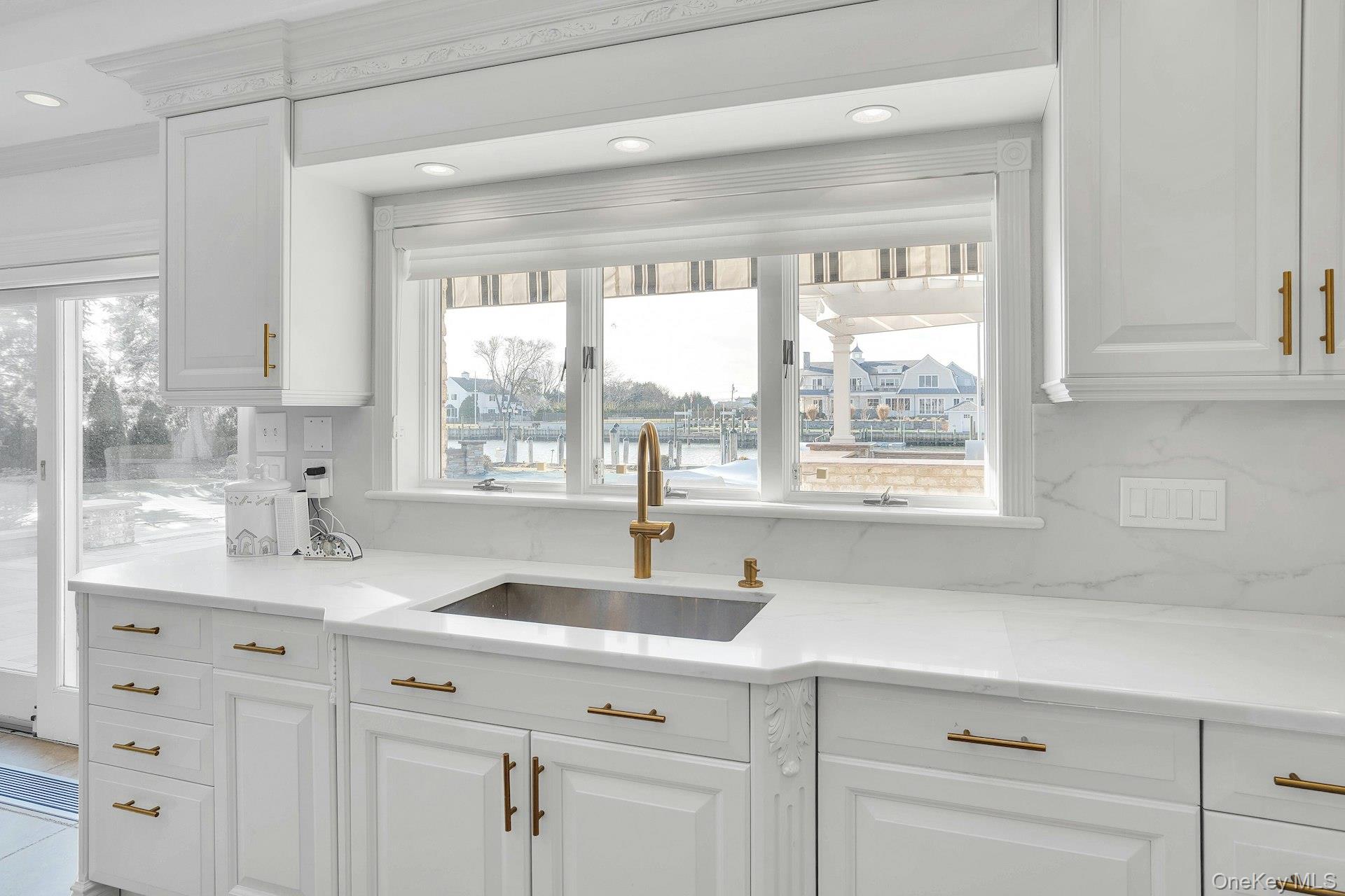 10 Beech Road Islip, NY 11751 - Photo 21 of 49 Who doesn't love a sink overlooking the yard?
