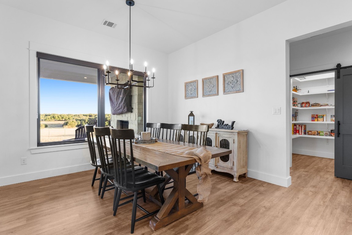 345 Judge's Road Burnet, TX 78611 - Photo 12 of 40 a view of a dining room with furniture and window