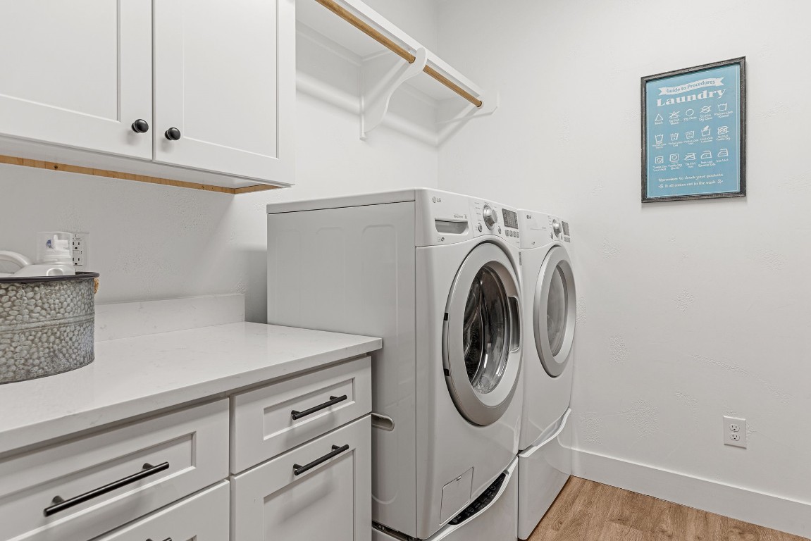 345 Judge's Road Burnet, TX 78611 - Photo 14 of 40 a utility room with dryer and washer