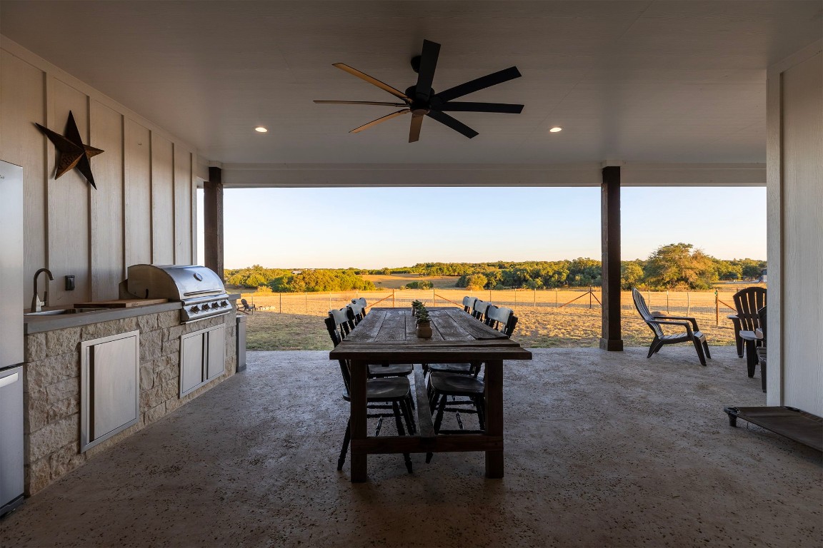 345 Judge's Road Burnet, TX 78611 - Photo 34 of 40 a view of a dining room with furniture and window