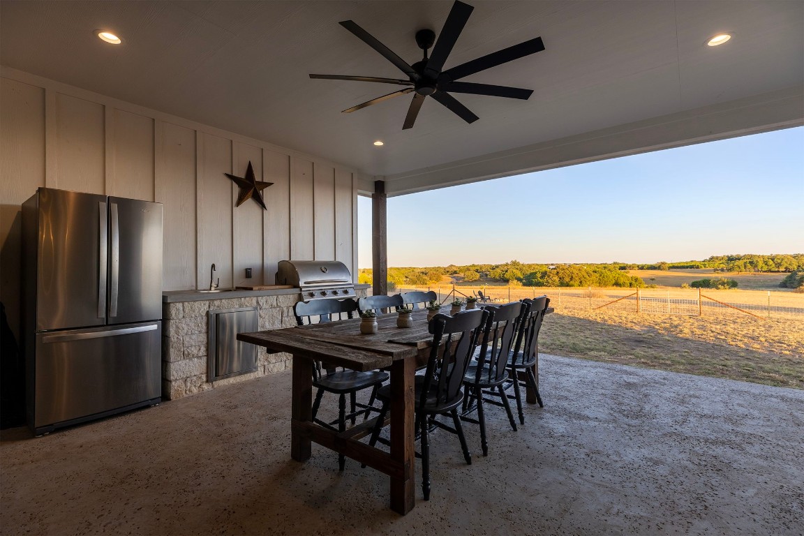 345 Judge's Road Burnet, TX 78611 - Photo 35 of 40 a view of a dining room with furniture window and wooden floor