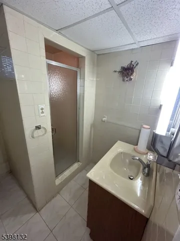 a bathroom with a sink and mirror