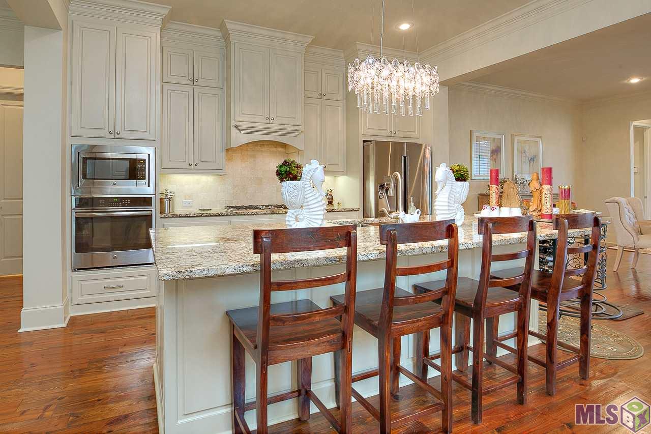 15514 Columbia Street Baton Rouge, LA 70817 - Photo 13 of 46 Kitchen features high cabinetry & stainless steel appliances