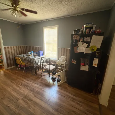 a bedroom with a bed and furniture