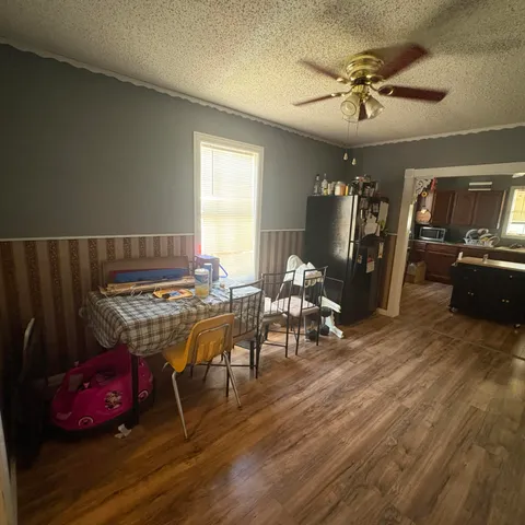 a bedroom with bed and a window