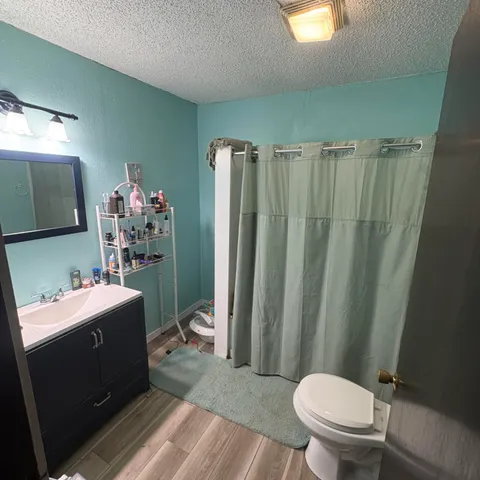 a bedroom with a bed and a walk in closet