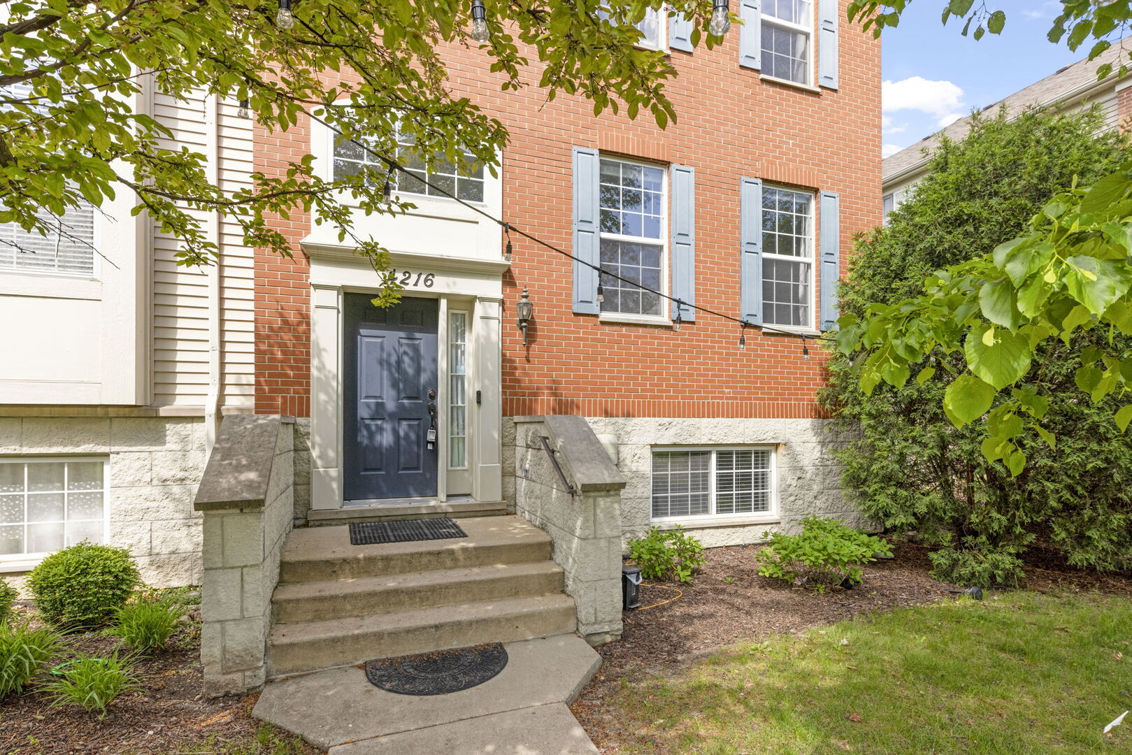 4216 Drexel Avenue Aurora, IL 60504 - Photo 2 of 48 a front view of a house with a yard