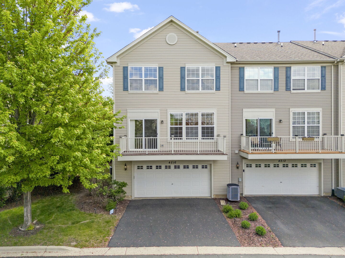 4216 Drexel Avenue Aurora, IL 60504 - Photo 32 of 48 a front view of a house with a garden