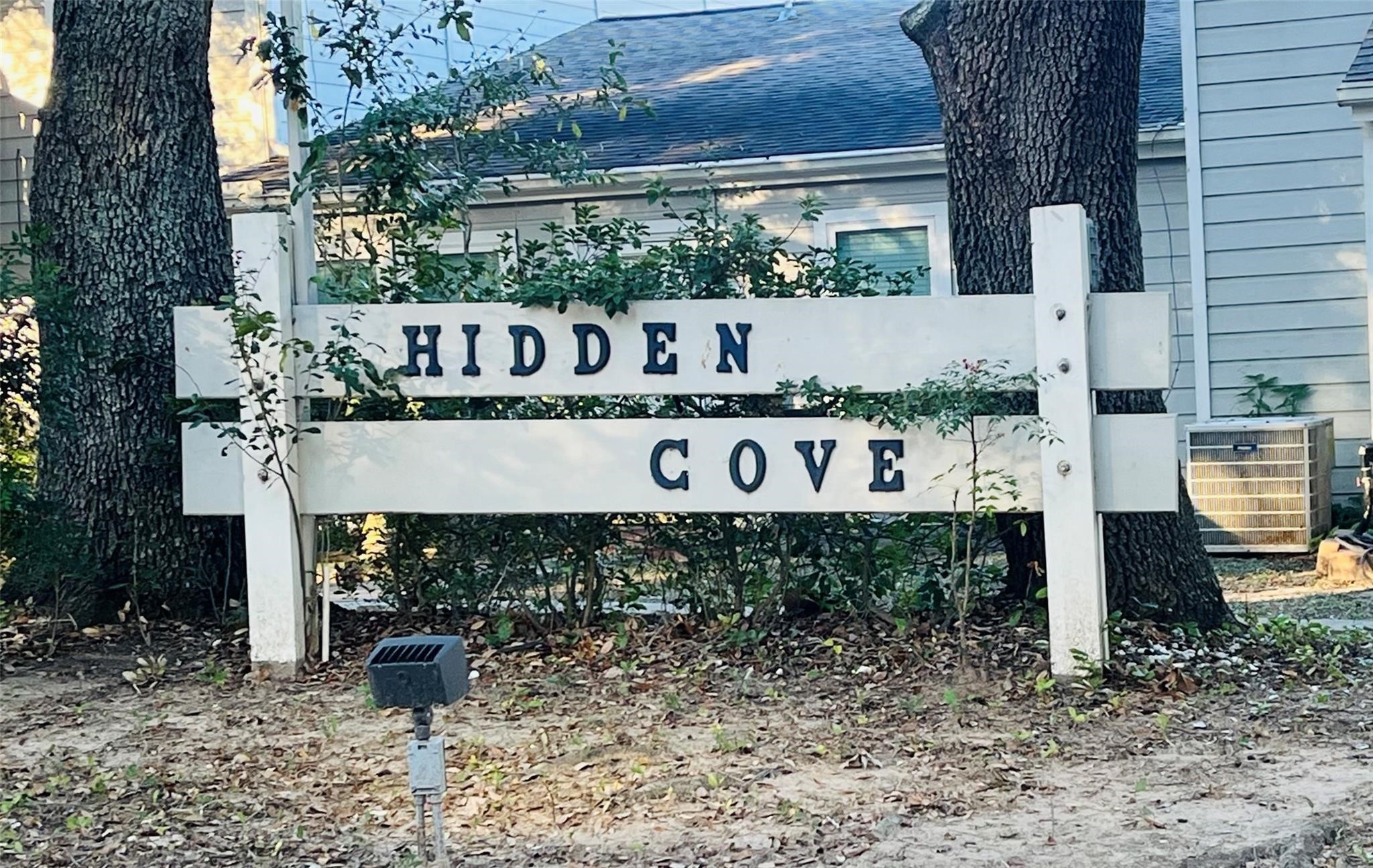 19 Hideaway Drive Friendswood, TX 77546 - Photo 11 of 11 a view of a sign board with wooden fence