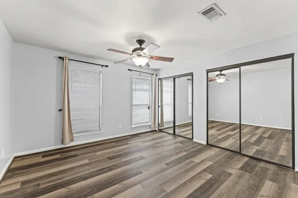 a bathroom with a toilet a sink and bathtub