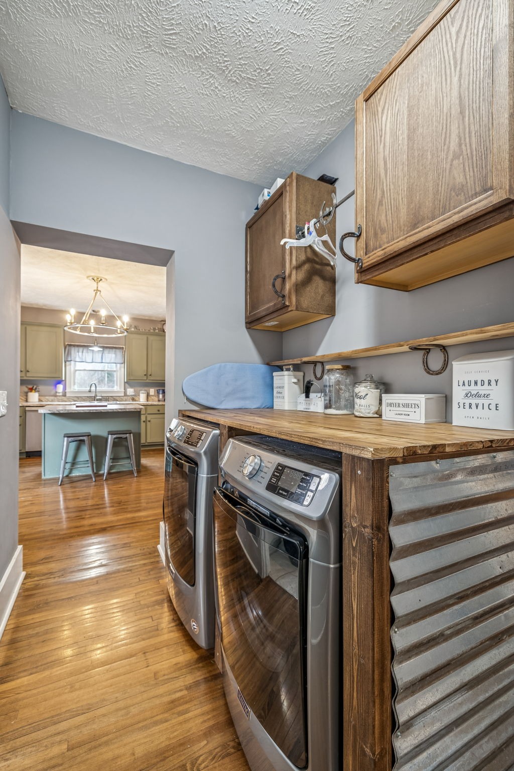 147 Sloan Branch Road Pleasant Shade, TN 37145 - Photo 24 of 53 a kitchen with a stove and wooden floor