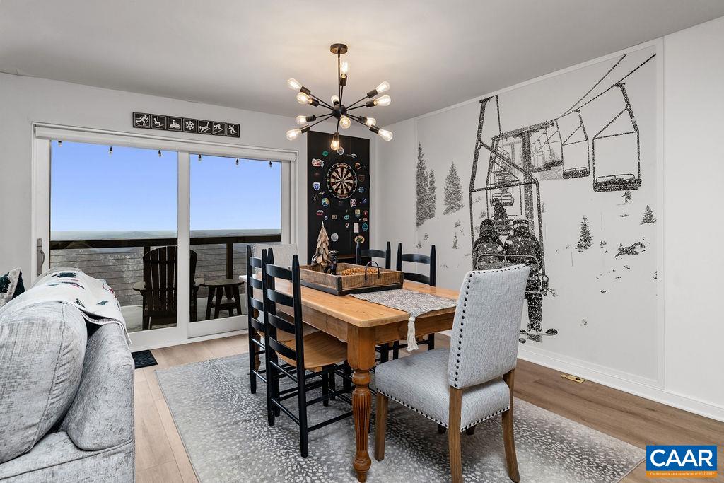 1411 Highlands Condos Roseland, VA 22967 - Photo 13 of 58 a dining room with furniture and window