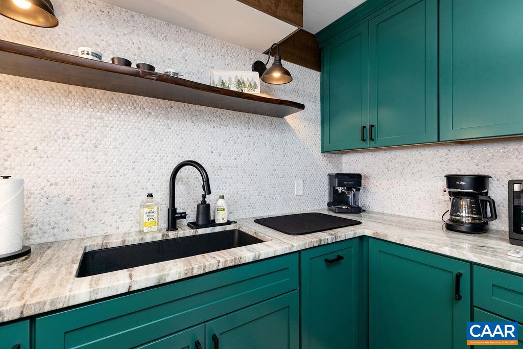 1411 Highlands Condos Roseland, VA 22967 - Photo 22 of 58 a kitchen with a sink and cabinets