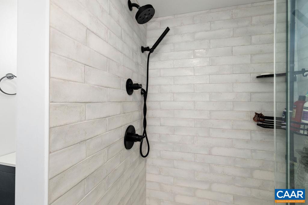 1411 Highlands Condos Roseland, VA 22967 - Photo 31 of 58 a bathroom with a shower