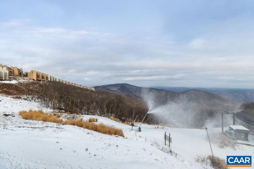 1411 Highlands Condos Roseland, VA 22967 - Photo 10 of 58 a view of roof with snow