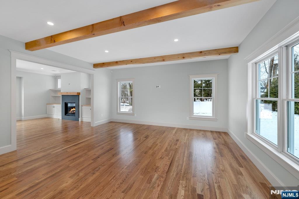 28 North Street Ramsey, NJ 07446 - Photo 13 of 50 a view of empty room with wooden floor and fan