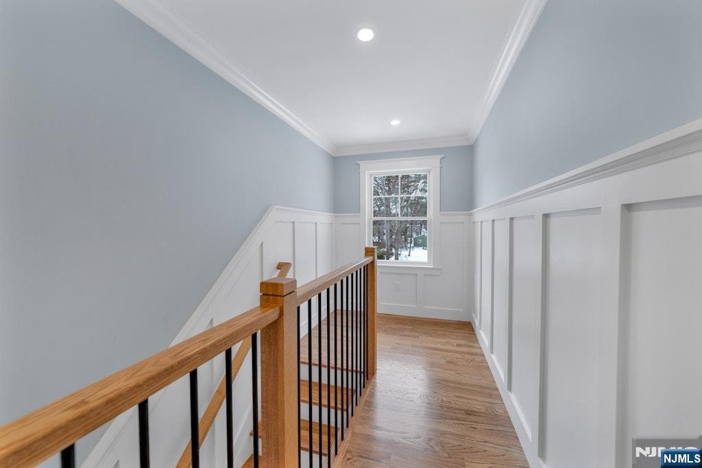 28 North Street Ramsey, NJ 07446 - Photo 23 of 50 a view of a hallway with wooden floor and staircase