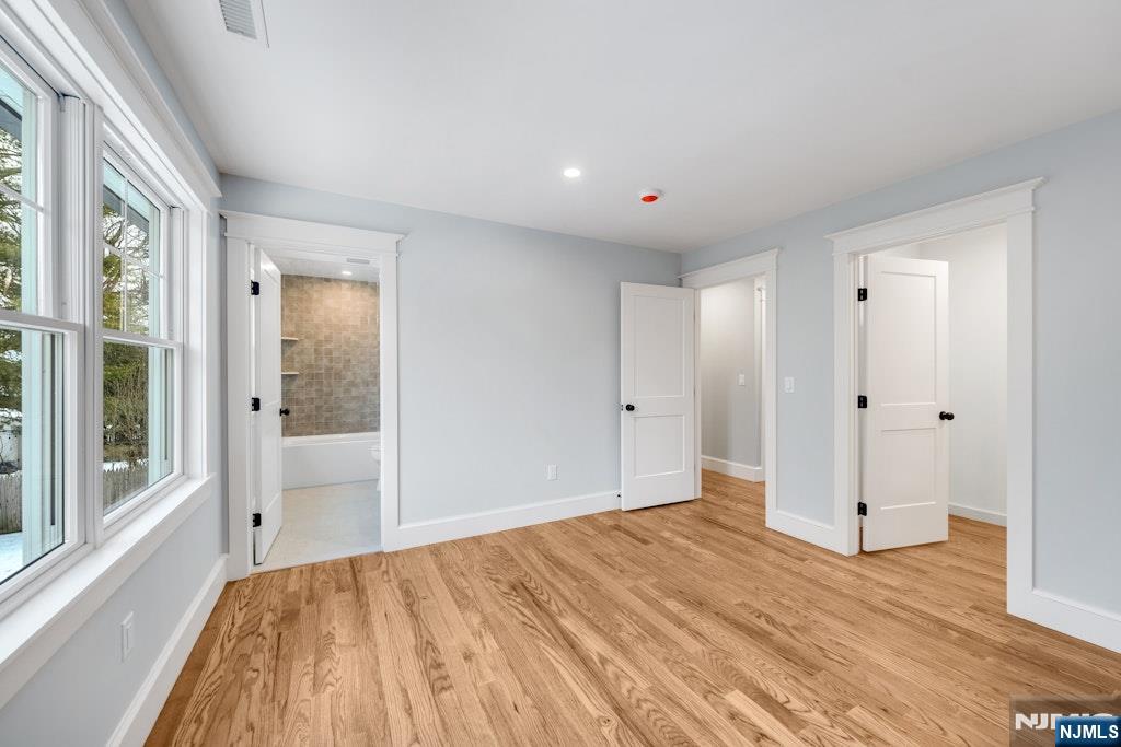 28 North Street Ramsey, NJ 07446 - Photo 31 of 50 a view of empty room with wooden floor and fan