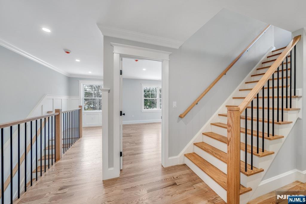 28 North Street Ramsey, NJ 07446 - Photo 40 of 50 a view of a hallway with wooden floor and entryway