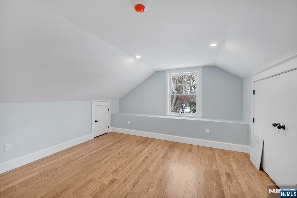 28 North Street Ramsey, NJ 07446 - Photo 43 of 50 an empty room with wooden floor and windows