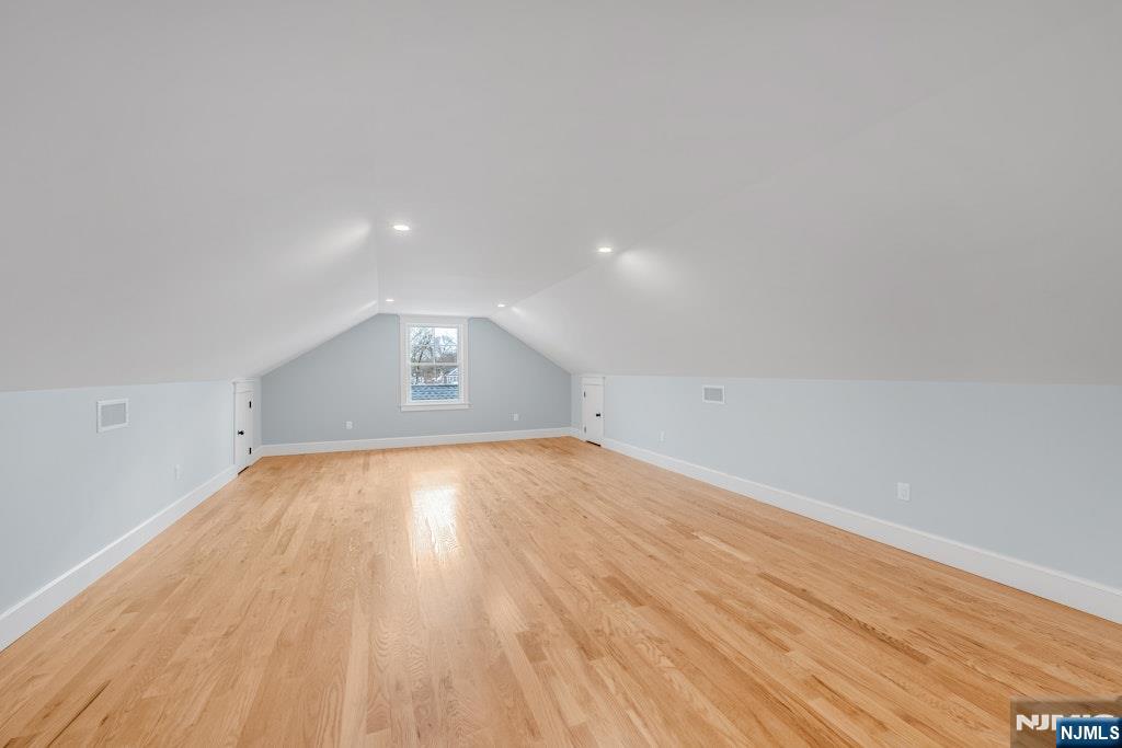 28 North Street Ramsey, NJ 07446 - Photo 44 of 50 a view of empty room with wooden floor and fan